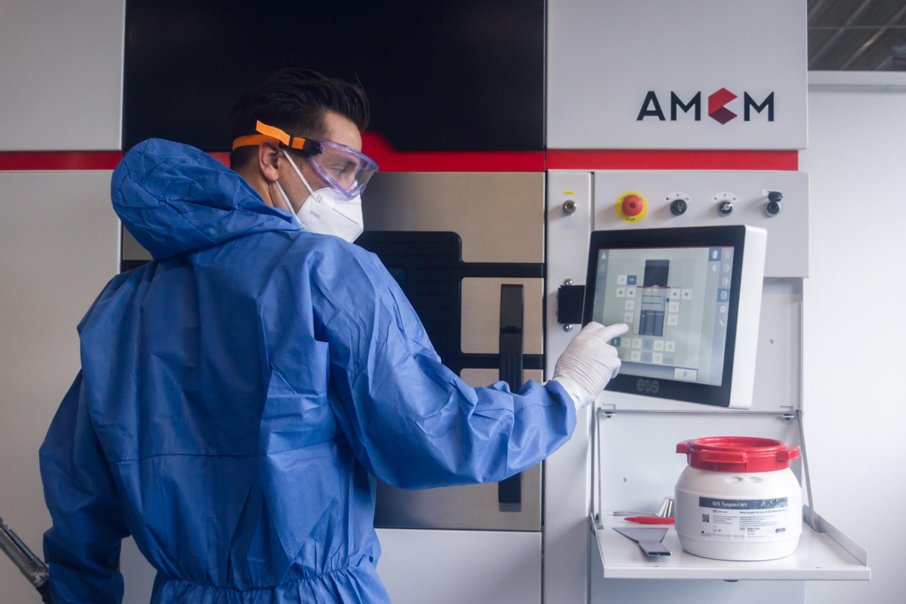 Operator in Protective Gear Operating the Control Panel of an AMCM M 290 FDR