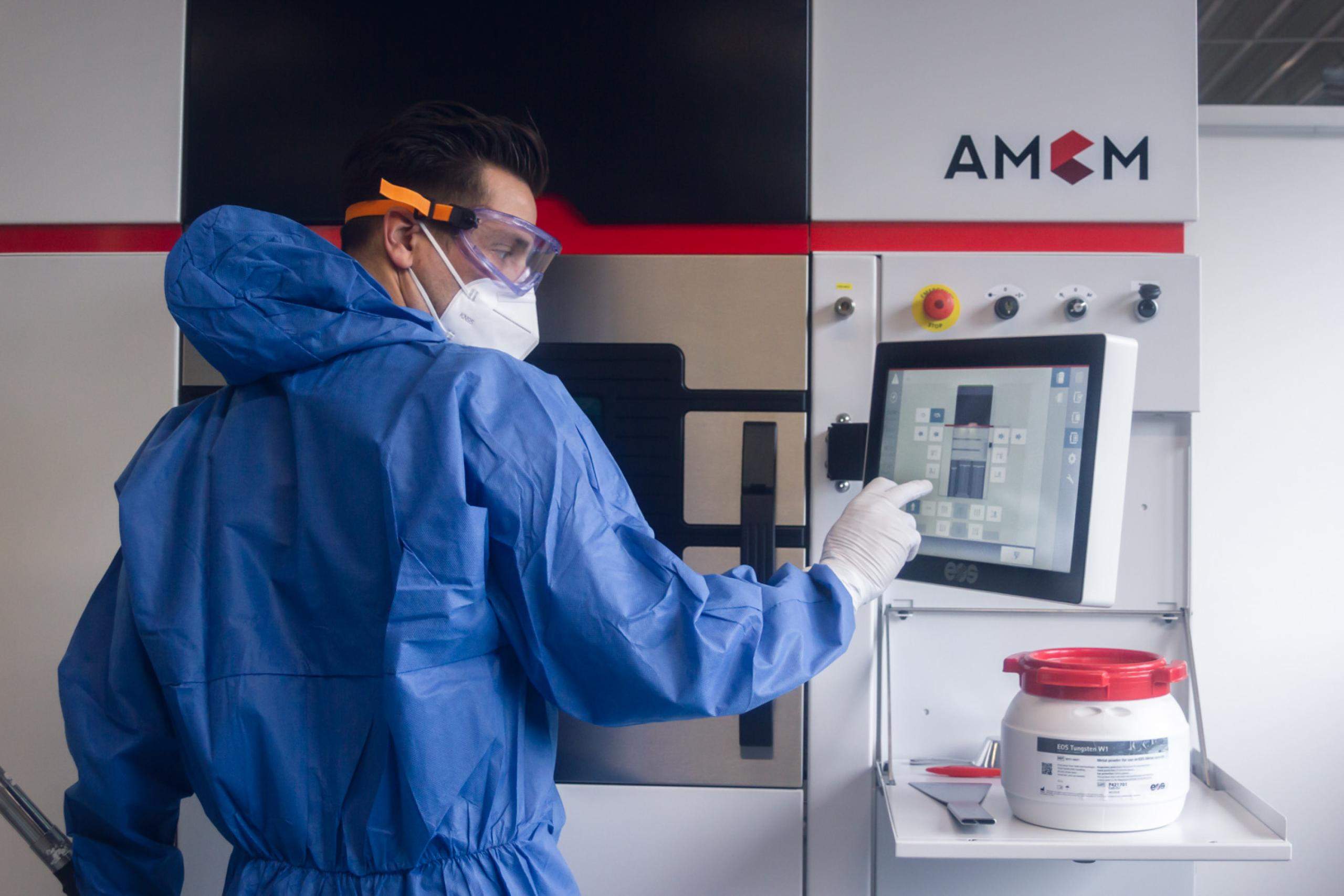 Operator in Protective Gear Operating the Control Panel of an AMCM M 290 FDR