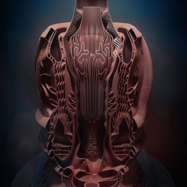 Copper alloy combustion chamber as a demonstrator (not for real use), printed on an AMCM M 4K system with a size of approx. 800 mm using Hyperganic Group's advanced software algorithms, without a single piece of CAD by hand.